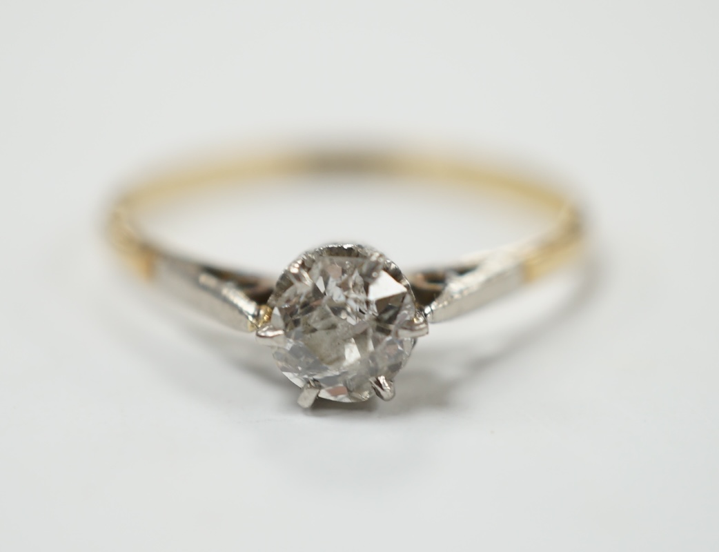 An 18ct, plat. and solitaire diamond set ring, size O, gross weight 1.7 grams. Fair condition.